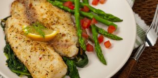 A plate of healthy Tilapia served with asparagus