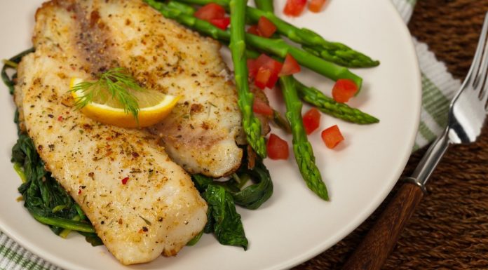 A plate of healthy Tilapia served with asparagus