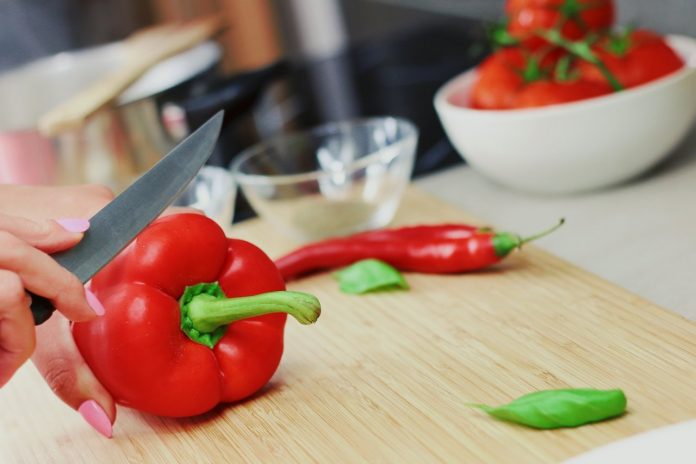 Chopping pepper for simple healthy meal
