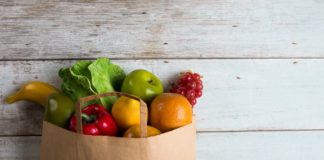 Grocery bag full of healthy foods for meal planning