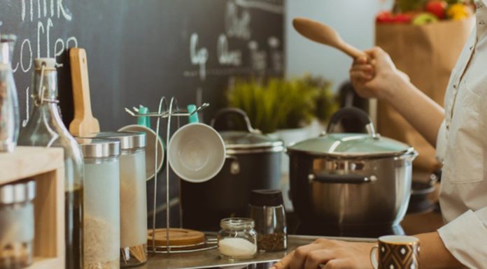 Cooking seafood in kitchen