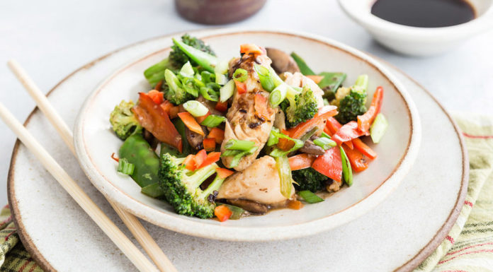 Tilapia stir fry with peppers, broccoli and mushrooms