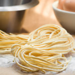 Fresh pasta on table