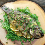 Grilled whole Tilapia with lemon butter and caper sauce