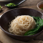 Bowl of noodles with vegetables