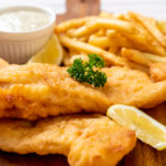 Haddock fish and chips with lemon