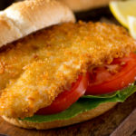 Milanese fish burger with lettuce and tomato