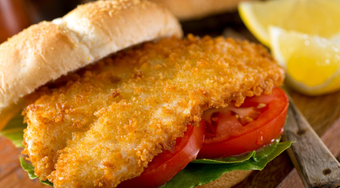Milanese fish burger with lettuce and tomato
